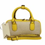 Borsa a mano e tracolla in paglia intrecciata con dettagli in ecopelle.